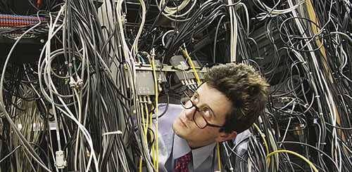 image of a guy overwhelmed by wiring